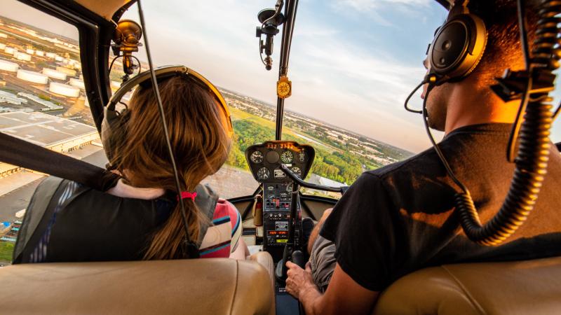 Two people flying a plane 